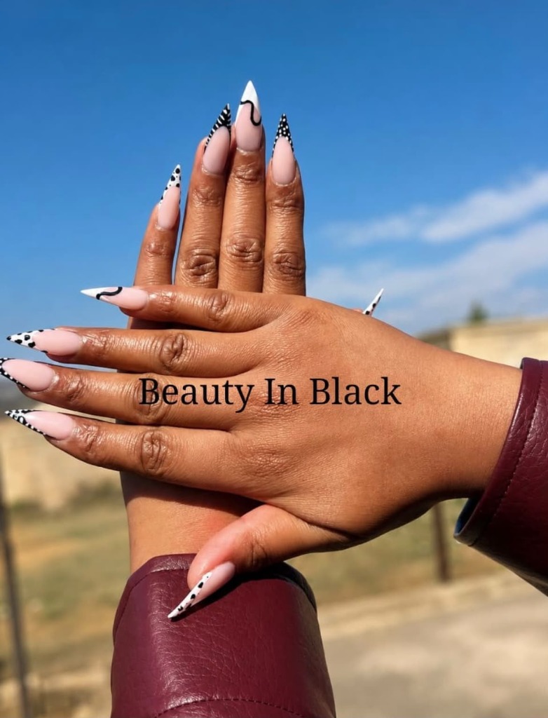 Skyline Polka Dot Stiletto Nails by Beauty In Black