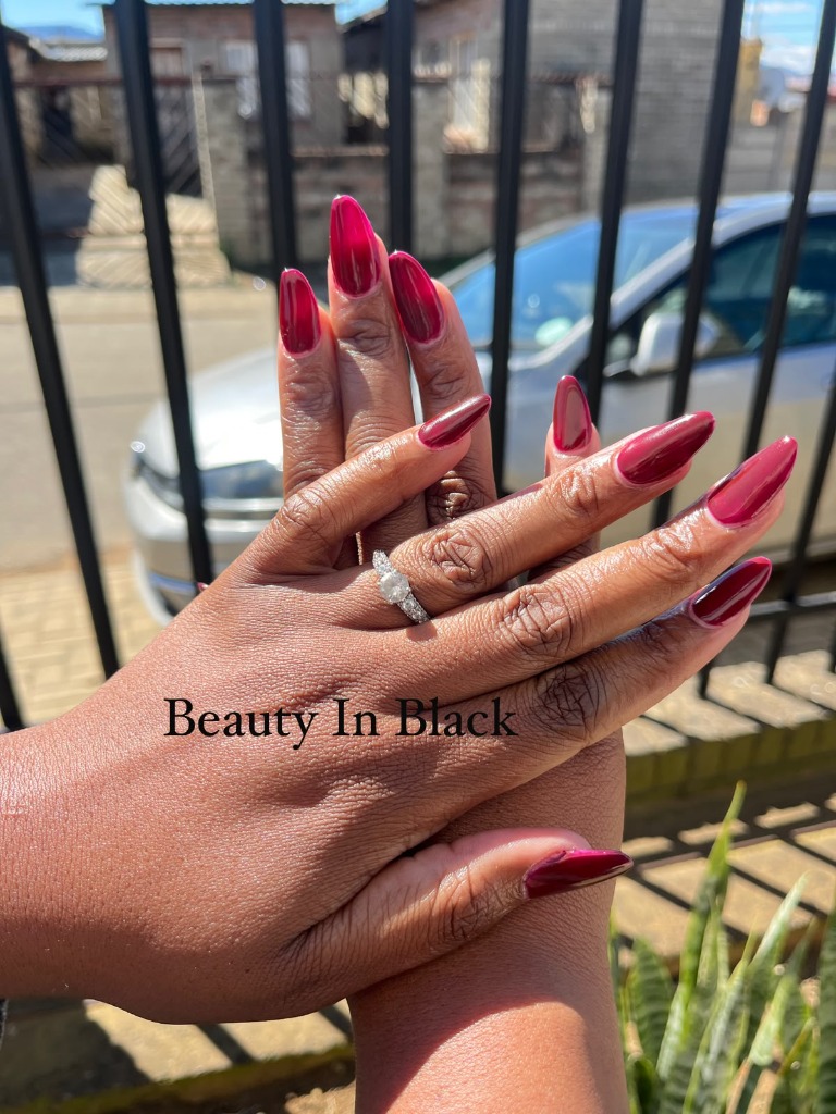 Glossy Ruby Red Stiletto Nails by Beauty In Black